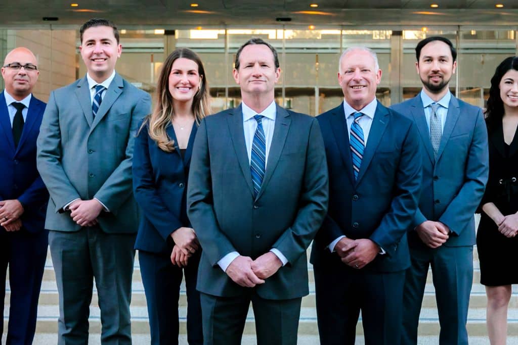 group of attorneys standing in front of court house in California