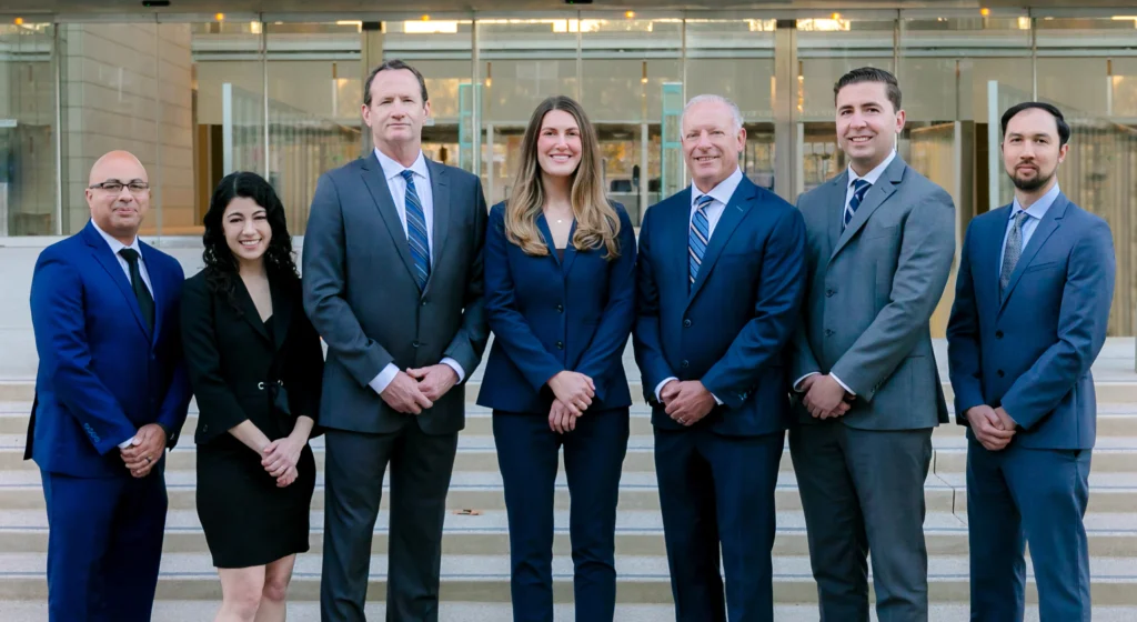 Lanzone Morgan nursing home abuse attorneys standing in front of court house