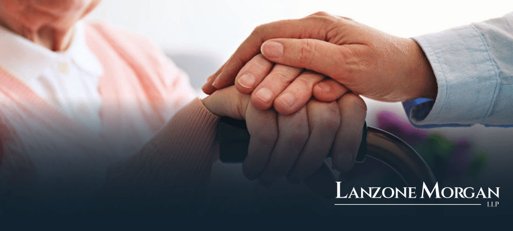 seniors in nursing home holding hands