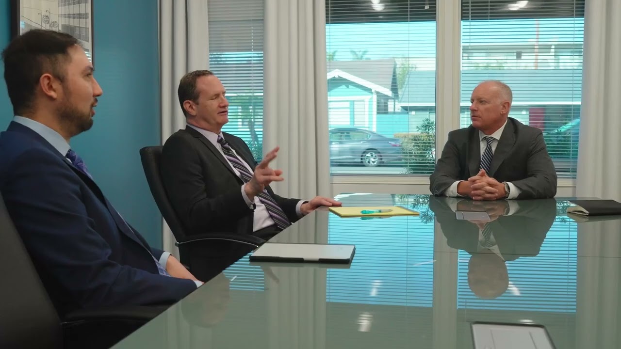 Attorney James Morgan and Attorney Anthony Lanzone in a meeting