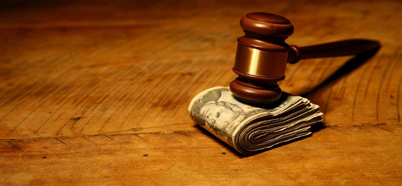 gavel sitting on top of bedsore settlement money
