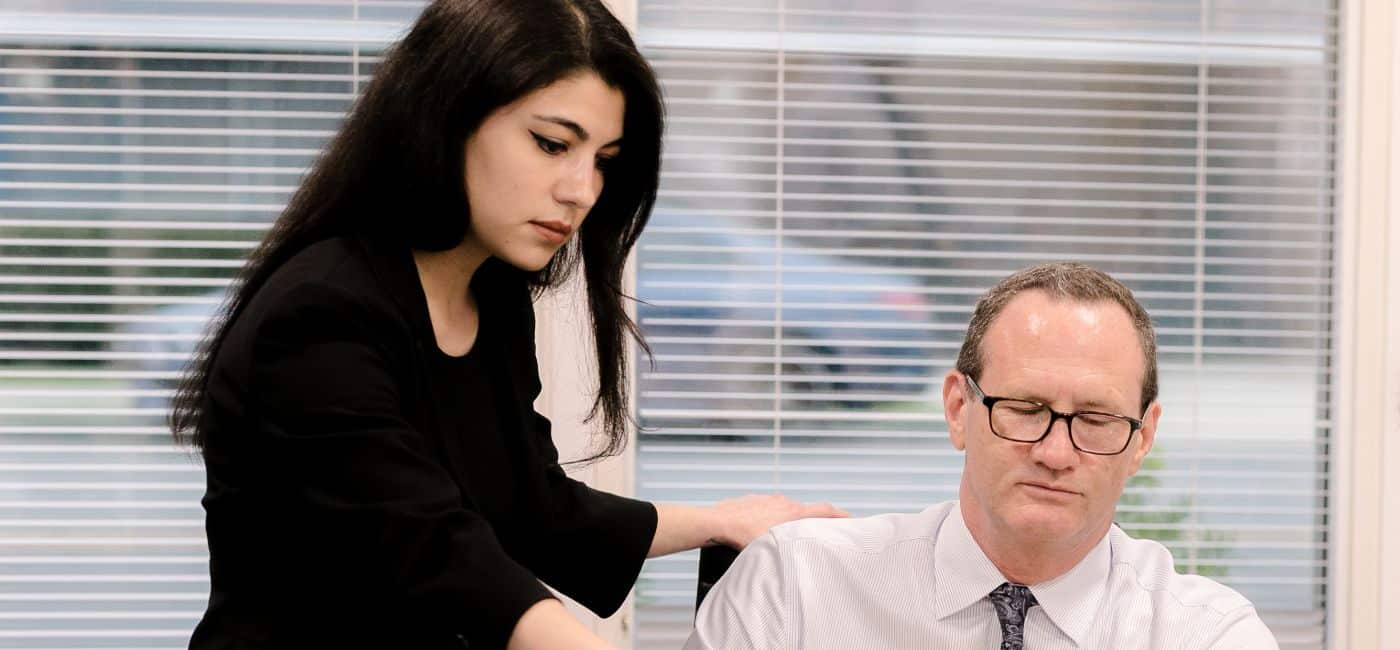 Elizabeth Kim talking to Jim Morgan about case